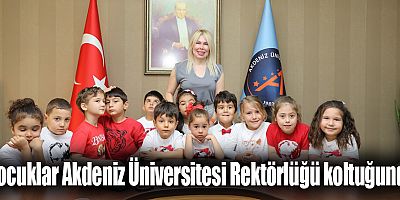 Çocuklar Akdeniz Üniversitesi Rektörlüğü koltuğunda