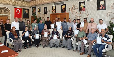 Aksu'da hak sahibi 15 vatandaş tapularını teslim aldı