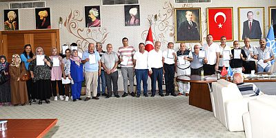 Aksu'da vatandaşlar tapularına kavuşuyor