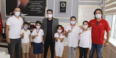 Başkan Turgay Genç Şampiyonları ağırladı