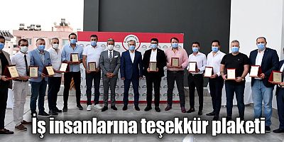 İş insanlarına teşekkür plaketi