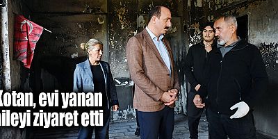 Kotan, evi yanan aileyi ziyaret etti