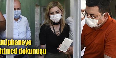 Kütüphaneye Tütüncü dokunuşu