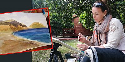 Rus turist baharı Çıralı'da resmediyor