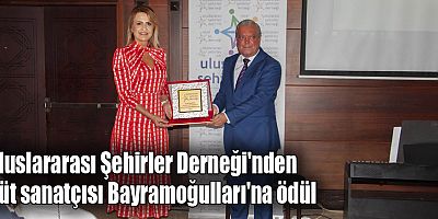 Uluslararası Şehirler Derneği'nden flüt sanatçısı Bayramoğulları'na plaket
